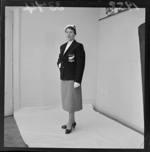 Unidentified woman modelling uniform for the Women's Indoor Basketball Team's 1958 tour of Australia