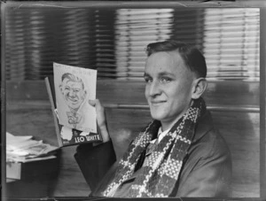 Portrait of MA 'Jeep' Halling, Air Training Corp, Takapuna, holding a caricature of Leo White