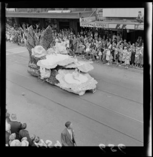 Festival of Wellington parade, showing the Hastings Blossom Festival float, and spectators, Willis Street, Wellington