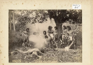 "The Banquet". Fijian men posed preparing for a cannibal banquet