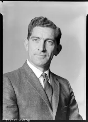 Mr R.G. Robinson in suit