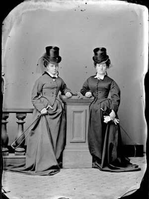 Two unidentified women wearing riding habits