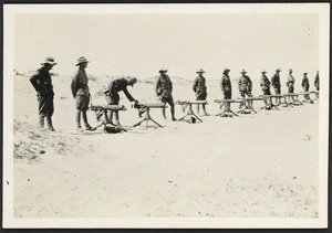 Row of soldiers with machine guns, Palestine, World War I