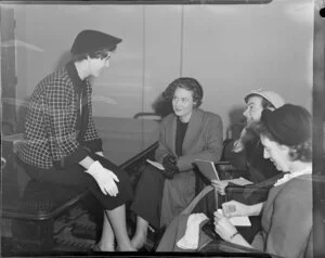 Miss J Breen, being interviewed by a group of women