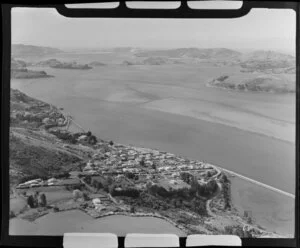 View of Saint Leonards, Roseneath, Dunedin City, with residential housing and farmland and Burkes Drive, looking north to Port Chalmers and Otago Peninsula and Heads beyond