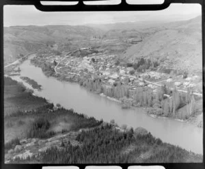 View of Roxburgh, Central Otago, within the Clutha River Valley, showing Scotland Street (State Highway 8) and pine plantation across river from town