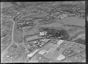 Mount Eden, Auckland, view over the Colonial Ammunition Company plant with shot tower next to The Kauri Timber Co Ltd, Normanby Road, with residential housing, Auckland Grammar School, Mount Eden Prison and railway line