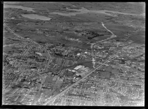 Showing Penrose Southern Motorway under construction, Auckland City area, with Great South Road and railway, intersecting with Pakuranga Highway, residential and commercial buildings, farmland beyond