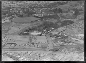Mount Eden, Auckland, view over the Colonial Ammunition Company plant with shot tower next to The Kauri Timber Co Ltd, Normanby Road, with residential housing and Auckland Grammar School