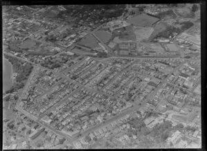 Newmarket Borough, Auckland City, view of Auckland Domain with Carlton Gore Road, Park Road and Auckland Public Hospital, Mount Eden Prison, railway line, Auckland Grammar School, residential and commercial buildings