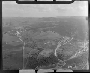 Pukemiro, Waikato District, showing residential housing and roads foreground, with the settlement of Rotowaro beyond