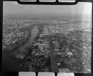 Hamilton, Waikato District, showing Waikato River with bridges, looking down Victoria Street, view south to Glenview and farmland beyond