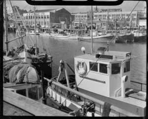 Auckland waterfront, showing fishing boats alongside wharf