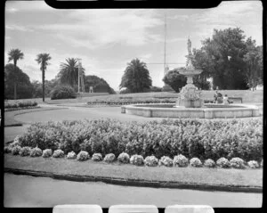 Albert Park, Auckland, showing fountain, gardens, and statue of Sir George Grey in background