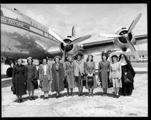 Unidentified group next to Pan American Airways aircraft, Whenuapai airport, Auckland