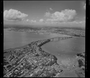 Northcote, North Shore City, featuring Little Shoal Bay and with Waitemata Harbour, Auckland Harbour Bridge, and Auckland City in the background