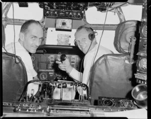Pan American World Airways, crew in cockpit of Boeing 377 stratocruiser, Clipper Rainbow, flight to Christchurch from Whenuapai, Auckland