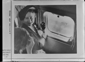 Queen Mother sitting in an aeroplane