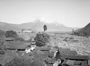 Yunnan, China. Farewell to Lijiang with Mount Sansato in the background. 10 December, 1938.
