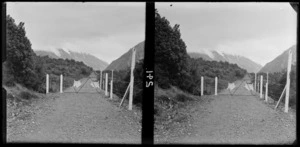 Metal road with a closed gate, [along the road to the Routeburn Track?]
