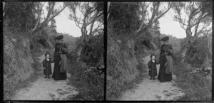 Lydia and Edgar Williams walking along a path, Woodhaugh or Botanic Gardens, near the Water of Leith, Dunedin