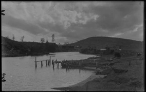 Cleared land beside an estuary or river with a derelict jetty, [Catlins?]