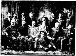 Back Row (from the bight)—Messrs W..T. Geddis (Fiec Lance), H. Harrison (NewZealand Times) T n w™™ /i-. • *. x „  Floor—Malcolm Ross (Otago Daily Times). (New Zealand Free Lance, 20 October 1900)