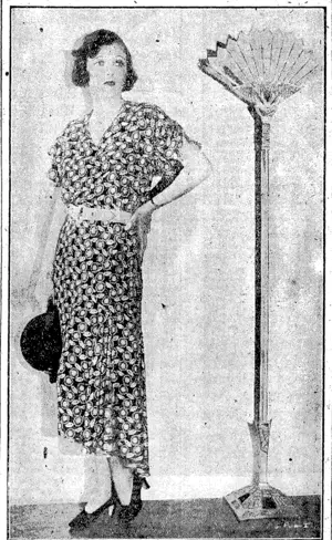 Corinnb Griffith, First National star, wears a charming afternoon ����� frock of brown, tan and white figured chiffon, with a double sleeveeffect ending just above the elbow. The tight fitting skirt falls m ' . hatidkerchief folds at the knee.  IIItUlMltlII11tllllttlllttI1IIIIIIlillMlMtllltlMlltlillItllllIMIIIIII11tllllII!lltIlllllllllltllllllllllllllllllIltllllllllllllllltrilllIMIIIIIirilMltllll1J1lllfllllUIIIIIIIIIIIIIIItltl1lllllllllll1l (NZ Truth, 02 October 1930)