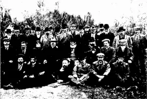 A GROUP AT MR IVERSEN'S ORCHARD, ALEXANDRA. (Otago Witness, 27 May 1903)