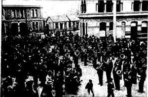 THE BANDS MUSTERING IN THE SQUARE. PORT CHALMERS (Otago Witness, 04 November 1903)