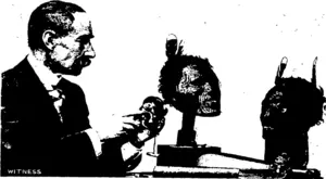MAJOR-GENERAL ROBLEY AND TWO SPECIMENS OF DRIEJ} MAORI HEADS.  Major-General Robley is the amthor of "Moko ; or, Maori Tattooing," a copy of which lies on the table in front of him. In his hand is a Maori tiki, and on the right a fine specimen of an Onewa ohib,"with a tiki resting on the handle. (Otago Witness, 08 February 1905)