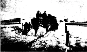 A STOPPAGE OF THE SNOW PLOUGH A FEW YARDS FROM ROUGH RIDGE STATION.  The view shows the snow nlough making a fresh attempt to break through the frozen  -now on the rails. (Otago Witness, 29 July 1908)