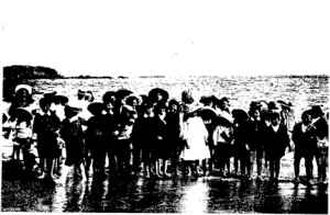SOUTHLAND EARLY SETTLERS' PICNIC AT THE OCEAN BEACH BLUFF. GROUP OF CHILDREN READY <Photoa by Phillips Bros.) TOR A PADDLE IN IHE WAVES (Otago Witness, 19 February 1908)