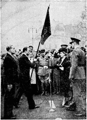 Mme. Benes presents colours to members of a Czech Legion in Britain. (Ellesmere Guardian, 24 January 1941)