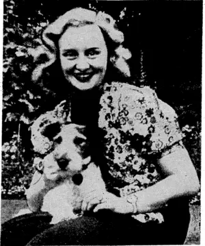 Miss Joyot Phillips, whose engagement to Flying-Officer E. J. Kaih is announced in today's cable news. This" picture, taken in" the garden of her parents9 home at Mollington, Chester, Erigland,i shows her with her fiance's dog. Miss Phillips, who is an actress, has been playing juvenile lead in Liverpool repertory, and is now with the Peterborough repertory. In England repertory -is conducted by professional players, a different play, being staged each week. (Evening Post, 15 April 1940)