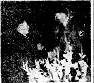 Mr. Neville Chamberlain arrives at Godeshurg and is greeted by the Fuhrer. (Evening Post, 22 April 1940)