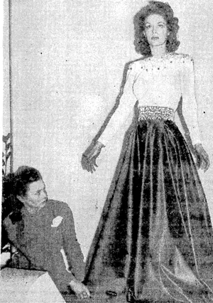 Lady Marguerite Strickland, the beautiful actress daughter of the Earl of Darnley, has become a saleswoman-mannequin in a Mayfair gown shop. Lady Marguerite now takes her place with the other shopgirls and sells clothes to her Mayfair friends. (Evening Post, 04 May 1940)