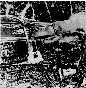 Sport and General" Photo. This picture shows the damage to the bridge over the Albert Canal at Maastricht, the bombing of which ivas the cause of an epic story cabled last week. R.A.F. volunteers were called for to carry out the fob. Four bombing crews were chosen by ballot and left immediately, escorted by fighters. Of the four cretvs only one man came back, but the bridge at Maastricht was blown up. (Evening Post, 04 June 1940)