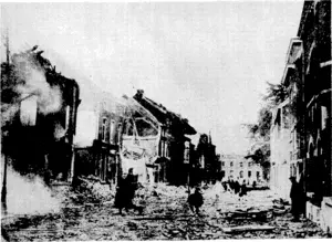 Sport and General" Photo. Refugees, with what little of personal belongings they have managed to save, leaving their home town after it had been bombed by German raiders. (Evening Post, 07 June 1940)