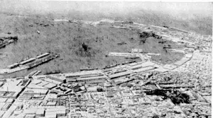 An aerial view of the great Egyptian seaport of Alexandria, for over a thousand years from its foundation capital of the country, and to which the eyes of the world are turned in the present crisis over the possession of the French navy. In the background >is the Mediterranean Sea. (Evening Post, 06 July 1940)