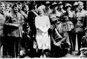 Her Majesty the Queen on June 27 visited the Victoria League Club, where soldiers, sailors, and airmen from all parts of the Empire stay when in London, and was photographed with this group of men representing almost every part of the Commonwealth of Nations. •*■< (Evening Post, 27 July 1940)