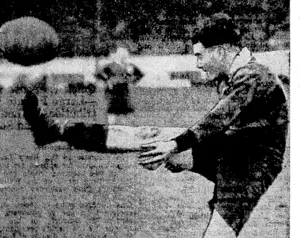 Evening Post" Photo. Trevor Lawton, Poneke's halfback, kicks clear when the ball comes to him in the match against Marist Brothers Old Boys at Athletic Park last Saturday. Poneke's victory kept Marist out of the first six to compete for championship honours. (Evening Post, 27 July 1940)