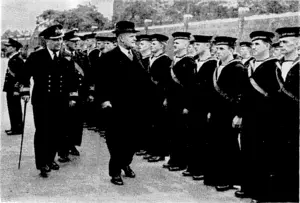 Sport and General" Photo. Mr. W. J. Jordan, High Commissioner for New Zealand in London, inspecting New Zealand members of the Royal Navy when they arrived at a British port recently. (Evening Post, 26 August 1940)