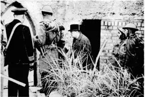 Sport and General" motor The Prime Minister, Mr. Winston Churchill, leaving a blockhouse when inspecting some of the defences against invasion in the south of England. (Evening Post, 31 August 1940)