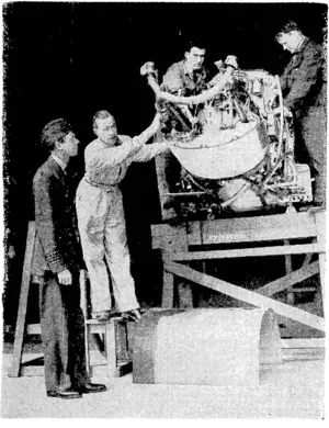The Duke of Kent discussing aeroplane engines with mechanics assembling a Spitfire at a Royal Air Force station in Scotland. (Evening Post, 03 September 1940)