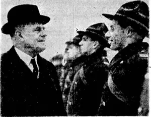 Mr. Jordan, High Commissioner for New Zealand, talking to a member of the Neiv Zealand contingent at an inspection in London on December 30, (Evening Post, 27 January 1940)