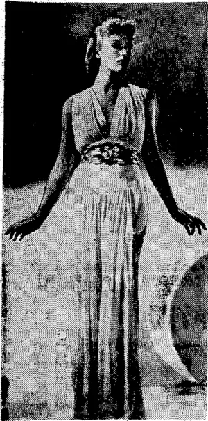 Ijorett^TxJung in a screen creation tvJiick has caused a lot of comment ahd whiph/' makesr':-a delightful i evening ensemble. (Evening Post, 27 January 1940)