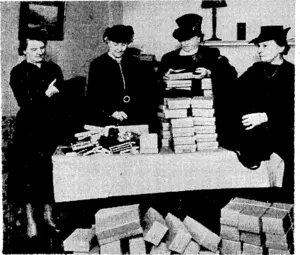 Members of the New Zealand Women's Society, which is operating in London, packing Christmas parcels for New Zealand servicemen already in England. From left, Mrs. W. J. Jordan, president of the society, Mrs. Lindo Levien, vice-president, Mrs. McNaugh„ , ton Christie, and Mrs. Mortimer Williams. (Evening Post, 07 February 1940)