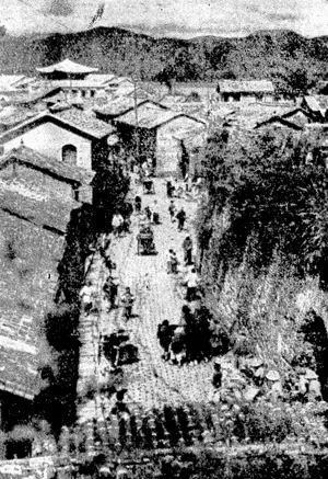 The old loion of Kunming,'- jormr.i i) ■■known as 1 dnnan-Jii.a Chinese- junction -towii on. ■ the Burma route to Chungking. It- was recently, bombed by Japanese aircraft-and virtually levelled to the ground. There, were. few. casualties among the inhabitants, as most of them had taken shelter. . . .* , . (Evening Post, 19 October 1940)