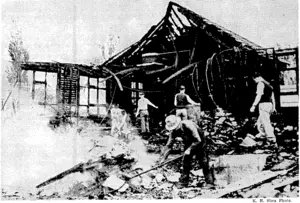 Fire completely destroyed the plant research building near Massey College early on Wednesday morning, causing the loss of irreplaceable records, some of them recording the life work of research officers. Salvage workers are seen searching the ashes for remnants which may be of value. (Evening Post, 01 November 1940)